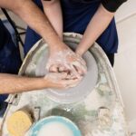 Guest shaping clay during the Tuscan Ceramics Masterclass with Factory Tour near Florence