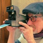 Leonardo Brogioni shooting with a Polaroid camera during a photo walk Oltrarno Florence at Fatacadabra