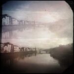 Finished double exposure photography Florence result showing the Arno river lungarni mirrored and layered in sepia tones