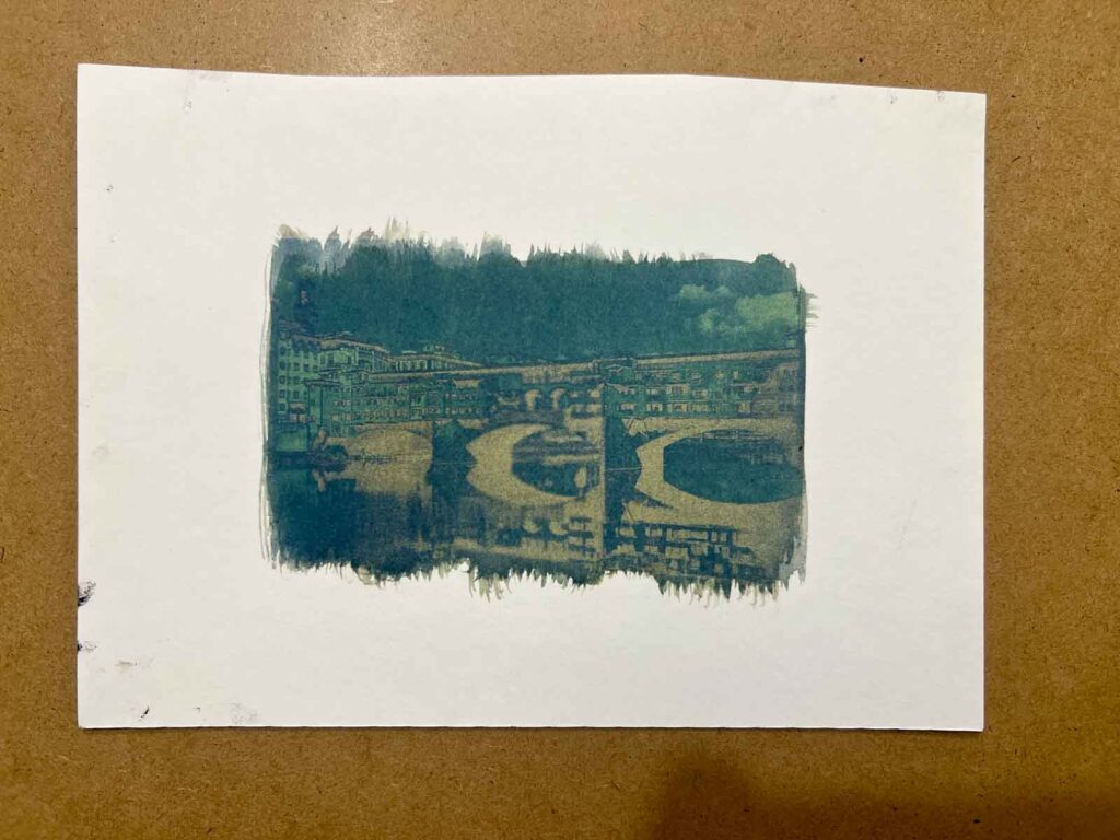 Finished teal blue cyanotype print of Ponte Vecchio from an analogue photography Florence session at Fatacadabra