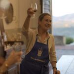 Host welcoming guests at a historic family villa during a cooking class near Florence in the Tuscan countryside