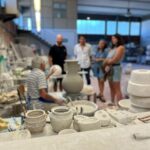Live pottery demonstration during a ceramics workshop near Florence factory tour